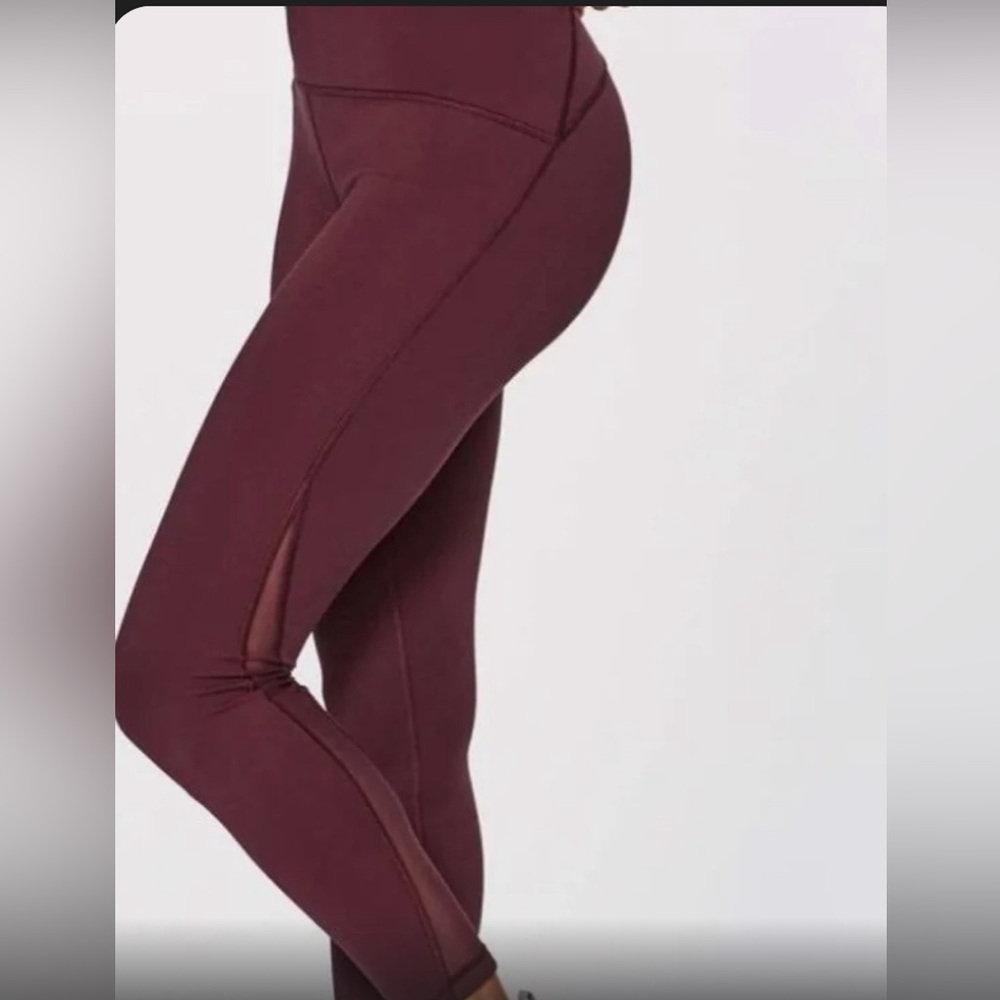 Lululemon Train Times, 7/8, 25 in , size 8 with mesh on the sides.